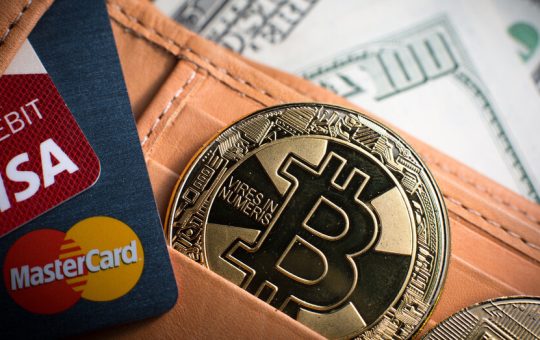 Debit cards, Bitcoin and dollar bills