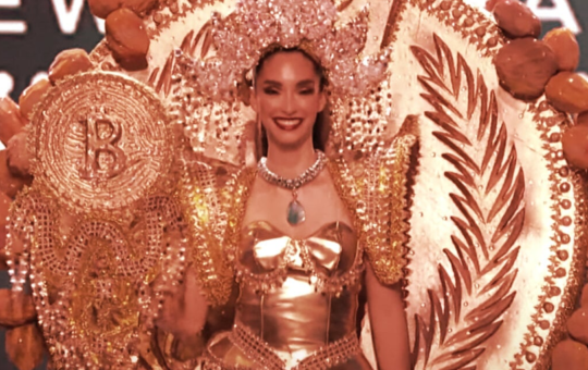 Miss Universe El Salvador Walks the Stage Holding Giant Bitcoin Staff